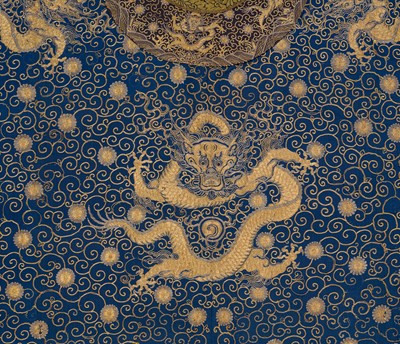 Lot 104 - AN IMPERIAL GOLD- AND SILVER-EMBROIDERED ‘NINE DRAGON’ ROBE, JIFU, QIANLONG