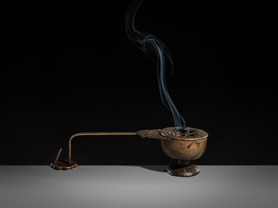 A BRONZE AND COPPER ‘LOTUS’ EKORO (LONG-HANDLED CENSER), NANBOKUCHO PERIOD