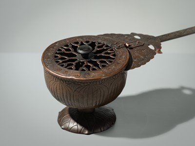 A BRONZE AND COPPER ‘LOTUS’ EKORO (LONG-HANDLED CENSER), NANBOKUCHO PERIOD