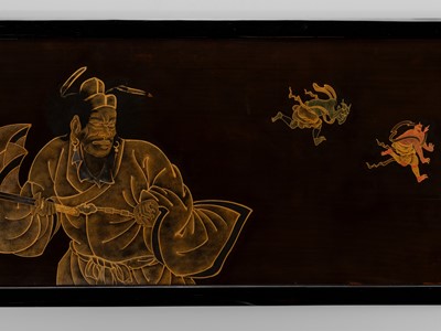 A SUPERB AND LARGE TOGIDASHI LACQUER PANEL DEPICTING SHOKI CHASING TWO ONI