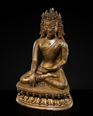 Lot 305 - A GILT COPPER ALLOY FIGURE OF THE CROWNED BUDDHA, TIBET, 15TH-16TH CENTURY