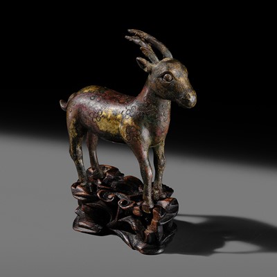 Lot 100 - A RARE GILT-BRONZE FIGURE OF A SPOTTED DEER, MING DYNASTY