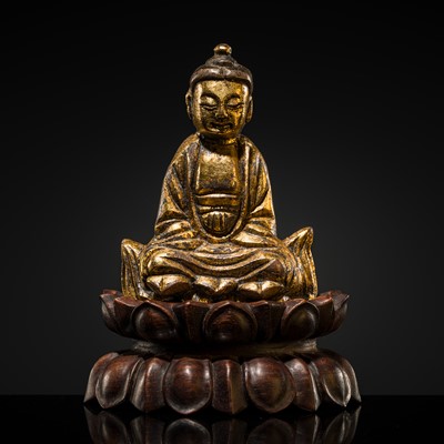 Lot 98 - A RARE AND INSCRIBED GILT-BRONZE FIGURE OF BUDDHA, LATER HAN DYNASTY (947-951), FIVE DYNASTIES, DATED 949