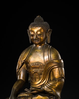 Lot 85 - A GILT-BRONZE REPOUSSÉ FIGURE OF THE CONTEMPLATING WISDOM BUDDHA, GUAN CHA HUI FO, QIANLONG INCISED SEVEN-CHARACTER MARK AND PERIOD