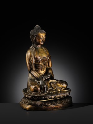 Lot 85 - A GILT-BRONZE REPOUSSÉ FIGURE OF THE CONTEMPLATING WISDOM BUDDHA, GUAN CHA HUI FO, QIANLONG INCISED SEVEN-CHARACTER MARK AND PERIOD