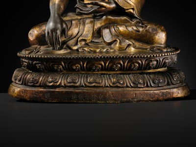 Lot 85 - A GILT-BRONZE REPOUSSÉ FIGURE OF THE CONTEMPLATING WISDOM BUDDHA, GUAN CHA HUI FO, QIANLONG INCISED SEVEN-CHARACTER MARK AND PERIOD