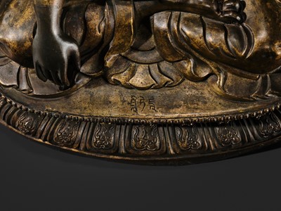 Lot 85 - A GILT-BRONZE REPOUSSÉ FIGURE OF THE CONTEMPLATING WISDOM BUDDHA, GUAN CHA HUI FO, QIANLONG INCISED SEVEN-CHARACTER MARK AND PERIOD