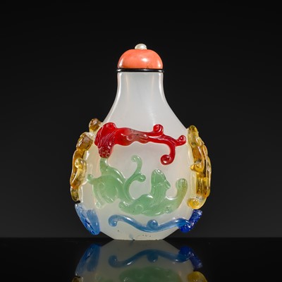 Lot 482 - A FOUR-COLOR OVERLAY MILKY-WHITE GLASS ‘EIGHT CHILONG’ SNUFF BOTTLE, QIANLONG-JIAQING PERIOD