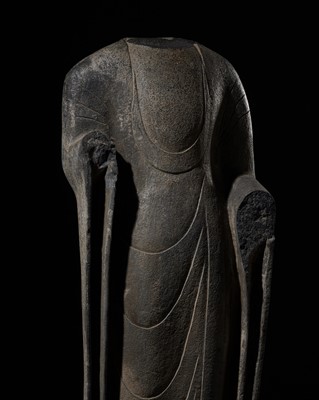 Lot 350 - A LARGE AND IMPORTANT STONE TORSO OF BUDDHA, NORTHERN QI-SUI DYNASTY
