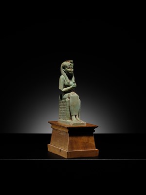 Lot 57 - A PALE TURQUOISE FAIENCE FIGURE OF ISIS AND HORUS, LATE PERIOD TO PTOLEMAIC ERA