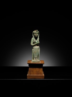 Lot 57 - A PALE TURQUOISE FAIENCE FIGURE OF ISIS AND HORUS, LATE PERIOD TO PTOLEMAIC ERA