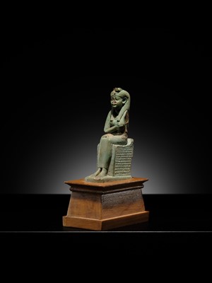 Lot 57 - A PALE TURQUOISE FAIENCE FIGURE OF ISIS AND HORUS, LATE PERIOD TO PTOLEMAIC ERA