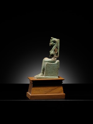 Lot 57 - A PALE TURQUOISE FAIENCE FIGURE OF ISIS AND HORUS, LATE PERIOD TO PTOLEMAIC ERA