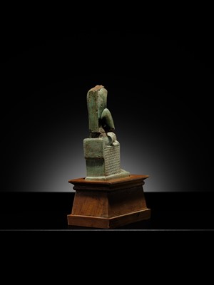 Lot 57 - A PALE TURQUOISE FAIENCE FIGURE OF ISIS AND HORUS, LATE PERIOD TO PTOLEMAIC ERA