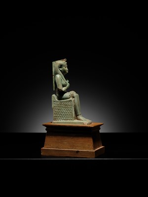 Lot 57 - A PALE TURQUOISE FAIENCE FIGURE OF ISIS AND HORUS, LATE PERIOD TO PTOLEMAIC ERA