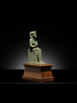 Lot 57 - A PALE TURQUOISE FAIENCE FIGURE OF ISIS AND HORUS, LATE PERIOD TO PTOLEMAIC ERA
