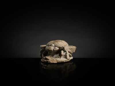 Lot 32 - AN INDURATED LIMESTONE FIGURE OF A WINGED SCARAB, KHEPRI, MIDDLE KINGDOM TO LATE PERIOD