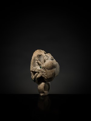 Lot 32 - AN INDURATED LIMESTONE FIGURE OF A WINGED SCARAB, KHEPRI, MIDDLE KINGDOM TO LATE PERIOD