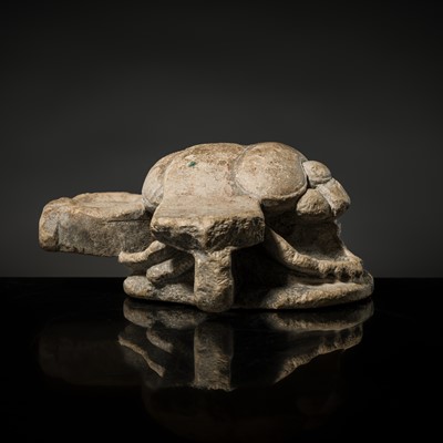 Lot 32 - AN INDURATED LIMESTONE FIGURE OF A WINGED SCARAB, KHEPRI, MIDDLE KINGDOM TO LATE PERIOD