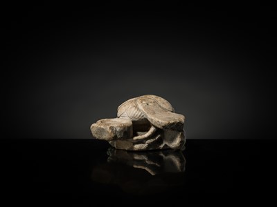 Lot 32 - AN INDURATED LIMESTONE FIGURE OF A WINGED SCARAB, KHEPRI, MIDDLE KINGDOM TO LATE PERIOD