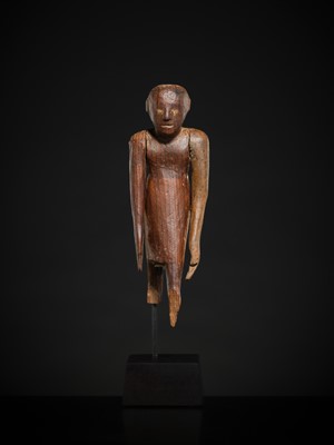 Lot 19 - A TOMB FIGURE OF A SERVANT, MIDDLE KINGDOM, 2133-1897 BC
