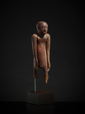 Lot 19 - A TOMB FIGURE OF A SERVANT, MIDDLE KINGDOM, 2133-1897 BC