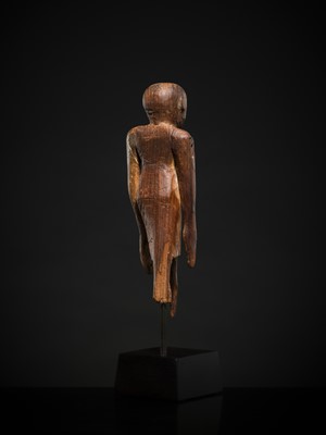 Lot 19 - A TOMB FIGURE OF A SERVANT, MIDDLE KINGDOM, 2133-1897 BC