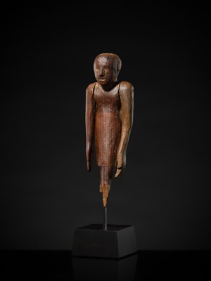 Lot 19 - A TOMB FIGURE OF A SERVANT, MIDDLE KINGDOM, 2133-1897 BC