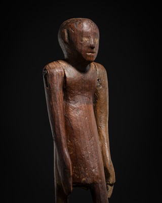 Lot 19 - A TOMB FIGURE OF A SERVANT, MIDDLE KINGDOM, 2133-1897 BC