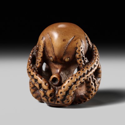 Lot 223 - MASATOMO: A FINE WOOD NETSUKE OF AN OCTOPUS
