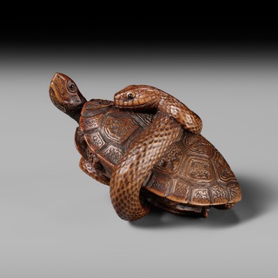Lot 160 - SHOKO: A SUPERB WOOD NETSUKE OF A SNAKE COILED AROUND A TORTOISE