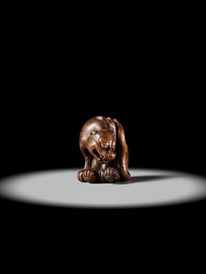 Lot 107 - A LARGE AND IMPRESSIVE WOOD NETSUKE OF A TIGER