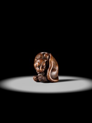 Lot 107 - A LARGE AND IMPRESSIVE WOOD NETSUKE OF A TIGER