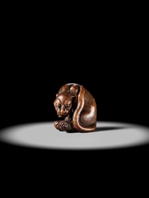 Lot 107 - A LARGE AND IMPRESSIVE WOOD NETSUKE OF A TIGER