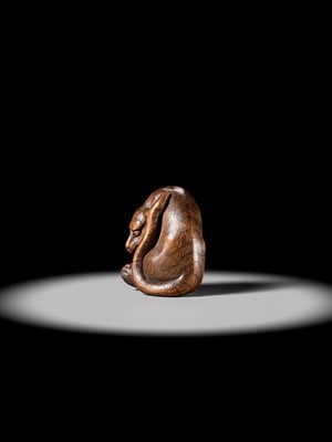 Lot 107 - A LARGE AND IMPRESSIVE WOOD NETSUKE OF A TIGER