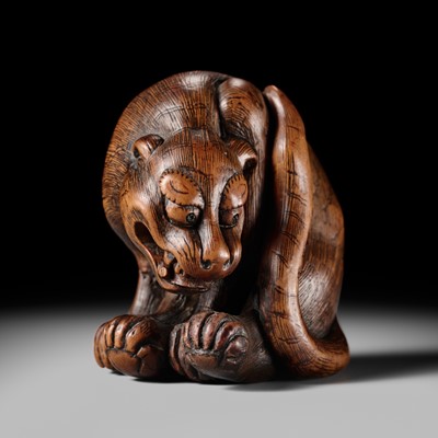 Lot 107 - A LARGE AND IMPRESSIVE WOOD NETSUKE OF A TIGER