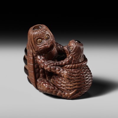 Lot 374 - AKIHIDE: AN AMUSING CONTEMPORARY WOOD NETSUKE OF TWO KAPPA