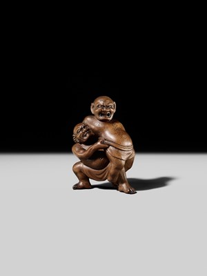 Lot 129 - MASAKAZU: A WOOD NETSUKE OF TWO SUMO WRESTLERS
