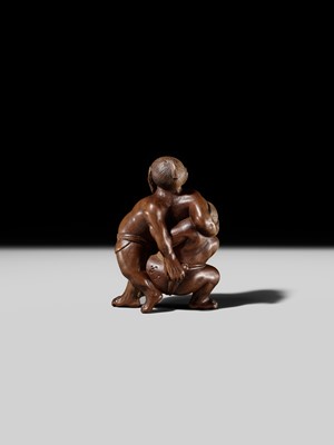 Lot 129 - MASAKAZU: A WOOD NETSUKE OF TWO SUMO WRESTLERS