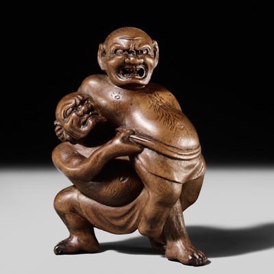Lot 129 - MASAKAZU: A WOOD NETSUKE OF TWO SUMO WRESTLERS