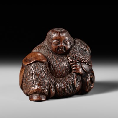 Lot 230 - MASATOSHI: A FINE NAGOYA SCHOOL WOOD NETSUKE OF KIKUJIDO (THE CHRYSANTHEMUM BOY)