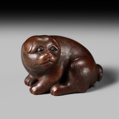 Lot 199 - MASANOBU: A WOOD NETSUKE OF A PUPPY