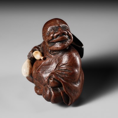 Lot 271 - TSUNETAKA: A FINE INLAID WOOD NETSUKE OF THE IMMORTAL CHOKARO