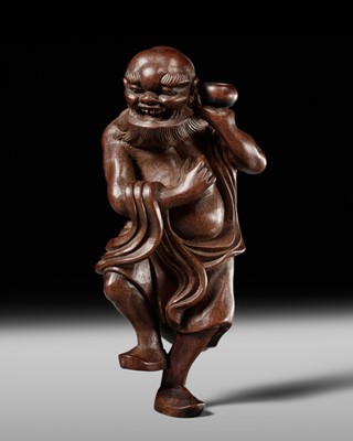 A TALL WOOD NETSUKE OF HANDAKA SONJA