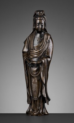 Lot 515 - A MASSIVE SILVER-INLAID SHISOU BRONZE FIGURE OF GUANYIN, QING DYNASTY