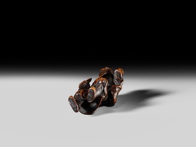 Lot 132 - HIDEMASA: A WOOD NETSUKE OF A CHORYO (ZHANG LIANG)
