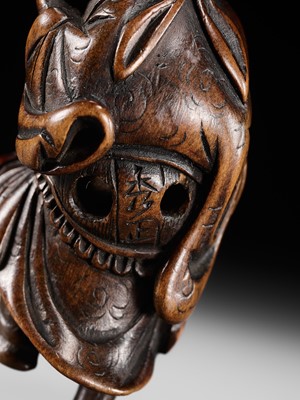 Lot 132 - HIDEMASA: A WOOD NETSUKE OF A CHORYO (ZHANG LIANG)