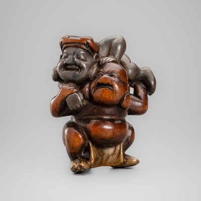 Lot 564 - AN AMUSING LACQUERED WOOD NETSUKE OF HOTEI AND DAIKOKU WRESTLING