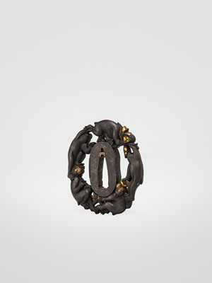 Lot 63 - TAKESHIGE: AN IRON SUKASHI TSUBA WITH FIVE MONKEYS IN A PEACH TREE