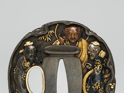 Lot 71 - A FINE HAMANO SCHOOL SHIBUICHI TSUBA WITH THE THREE SAKE TASTERS